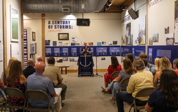 Sec. Reid Wilson announces APNEP grant awards at an Aug. 10, 2026, event on Harkers Island.