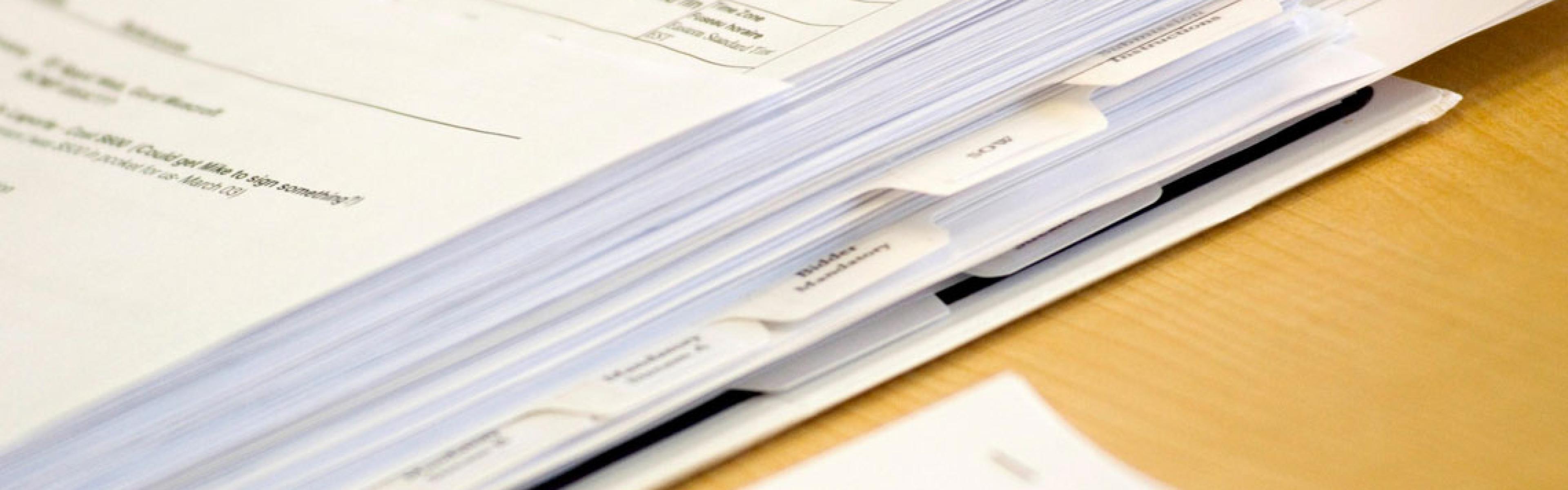 Stack of forms.