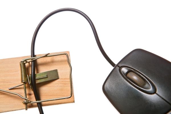 Computer mouse chord caught in a mouse trap