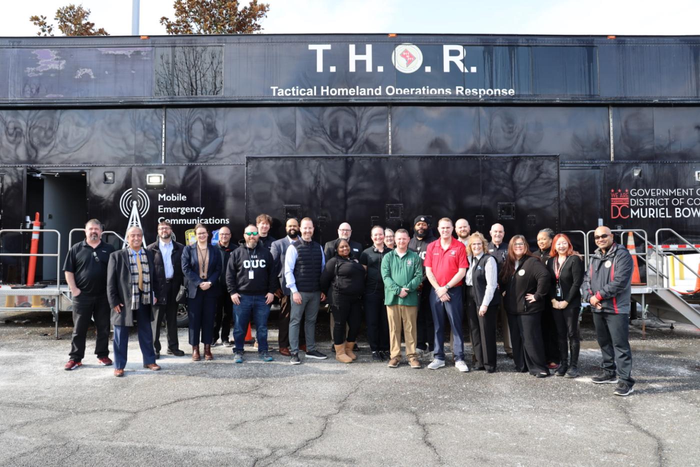 N.C. 911 Board team and others in front of the THOR unit.