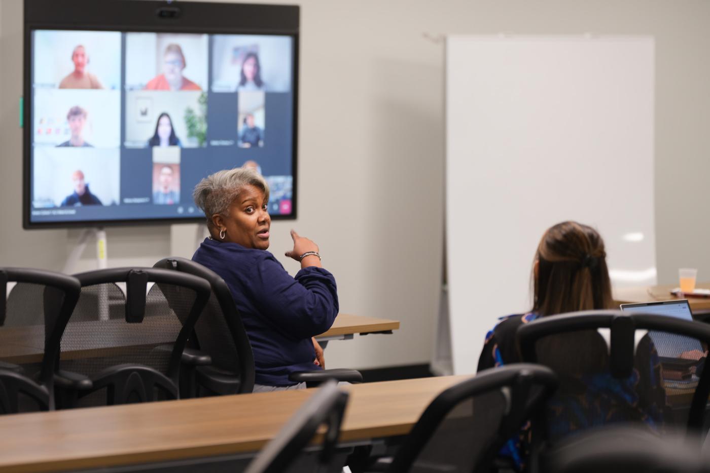 Bernice Russell-Bond speaking to CNN interns at a meet and greet