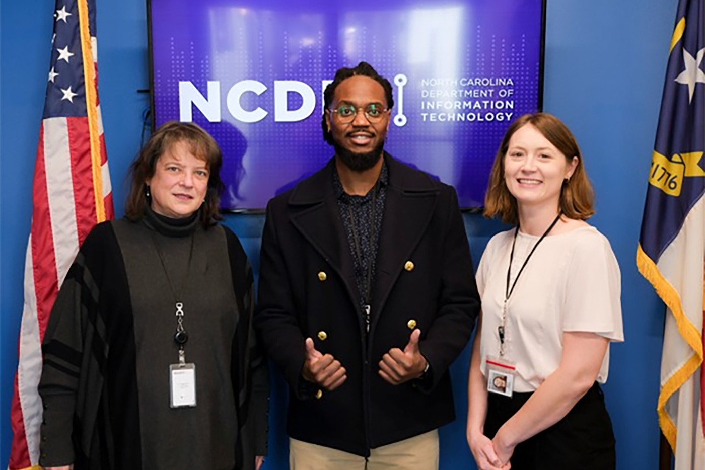 Susan Miller, director of grants management, Wil Thomas, compliance supervisor, and Adora Thayer, compliance supervisor, receive an Award of Excellence from the Office of the State Auditor.