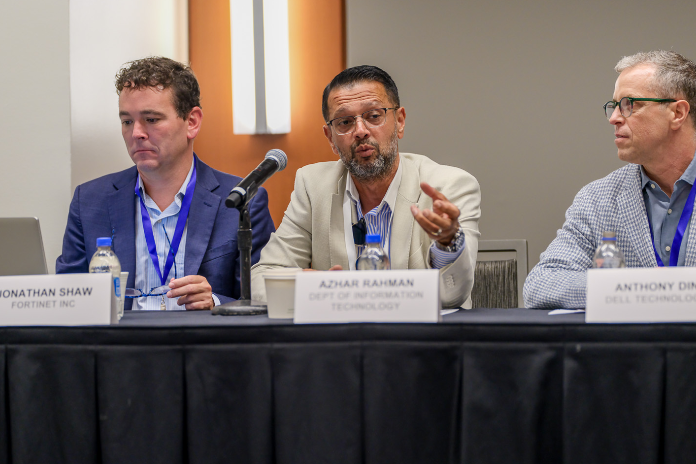 Chief Data Officer Azhar Rahman speaks about managing data on a panel with two other people at the N.C. Digital Government Summit on Aug. 19, 2026.