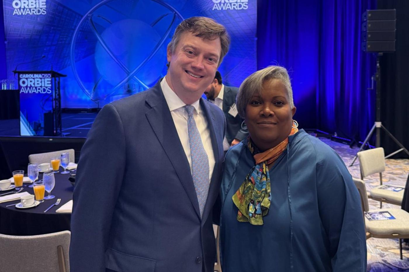 Secretary Nate Denny and State Chief Information Officer Security Bernice Russell-Bond celebrate at the ORBIE Awards ceremony in Charlotte on Sept. 9.