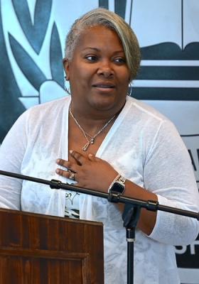 State Chief Information Security Office, Bernice Russell-Bond speaking at a podium