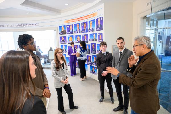 Deputy Secretary for AI and Policy I-Sah Hsieh talking with High Point University students