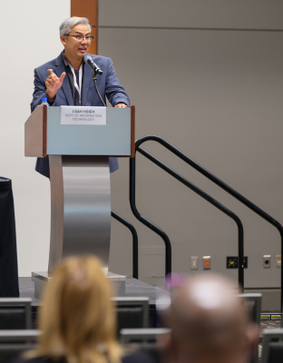 Deputy Secretary for AI and Policy I-Sah Hsieh speaks on AI adoption at the N.C. Digital Government Summit on Aug. 19.
