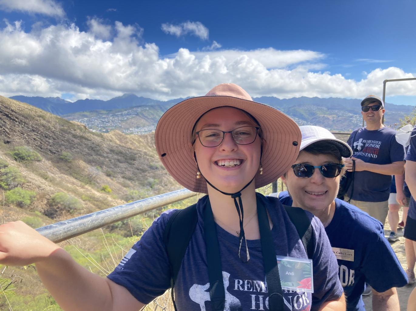 Andi, NC student, being photobombed by Dr. Gorn during the climb up Diamond Head Crater. 