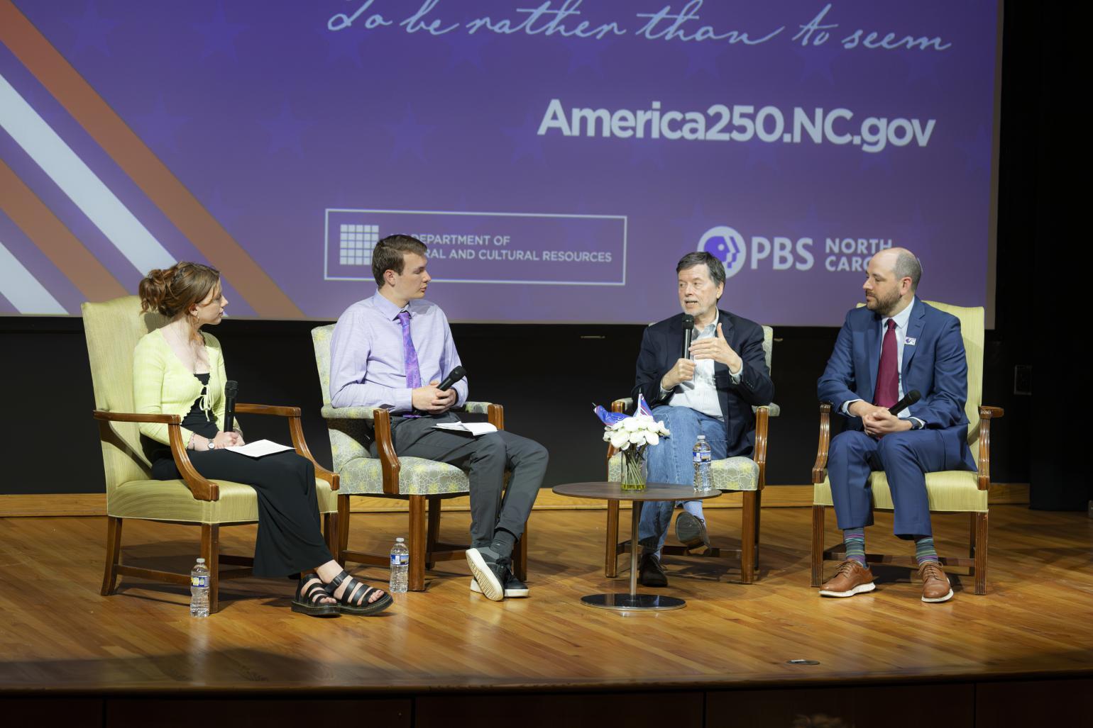 Valencia's students interviewing Ken Burns on stage.