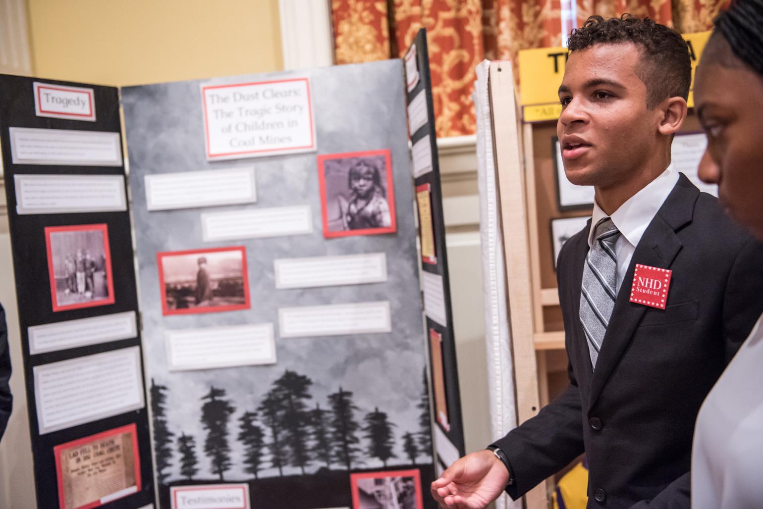 Students present their exhibit to judges.