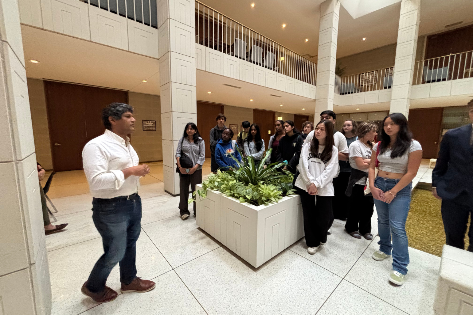 Students listen to a NC Representative talk in the NC General Assembly Building