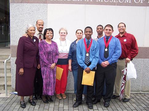 Tim and his teammate with their families at the 2005 competition.
