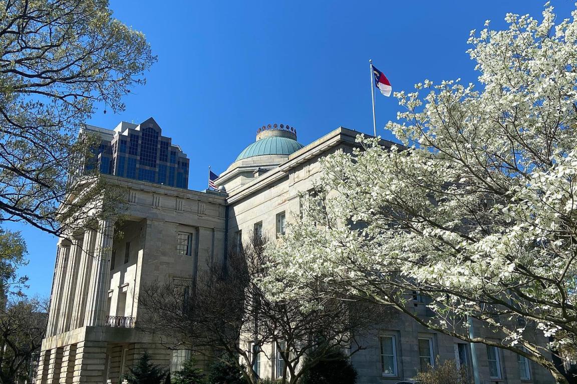 View of the North Carolina State Capitol Exterior with Flowering Dogwood Trees