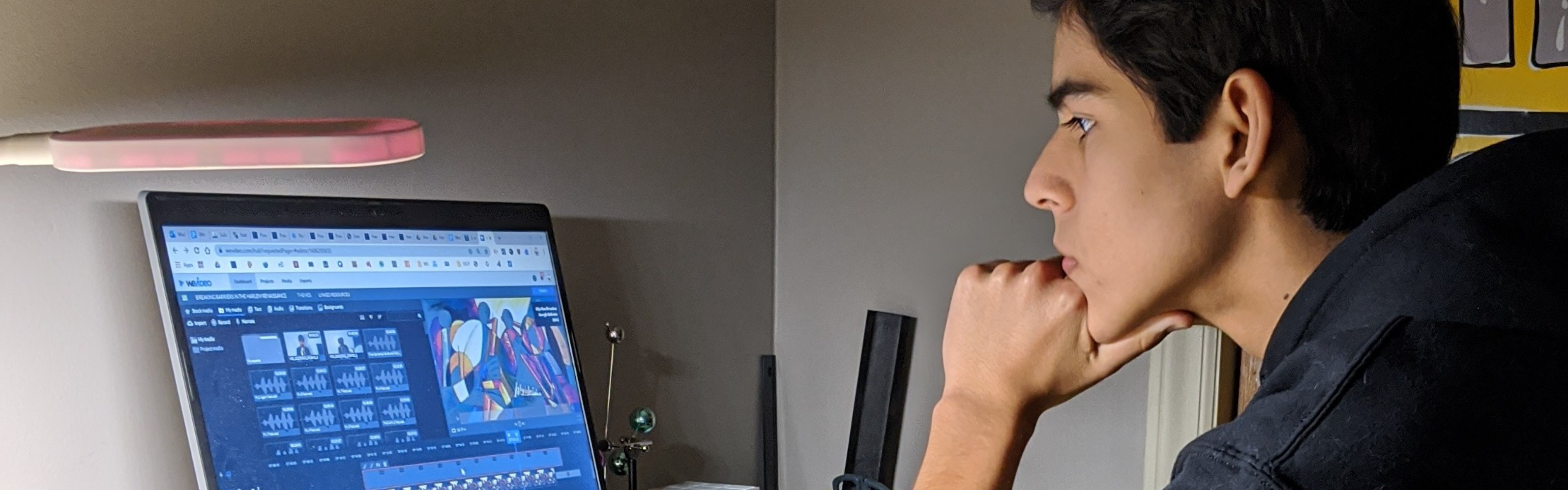 A History Day student works on editing his documentary.