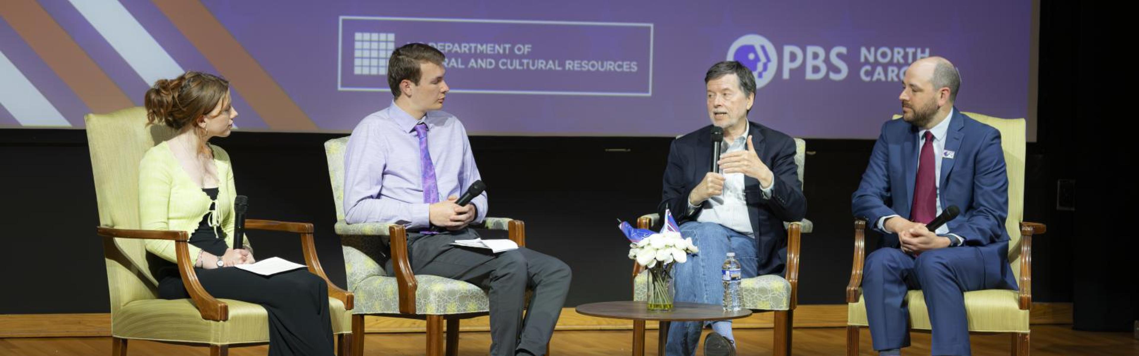 Valencia's students interviewing Ken Burns on stage.