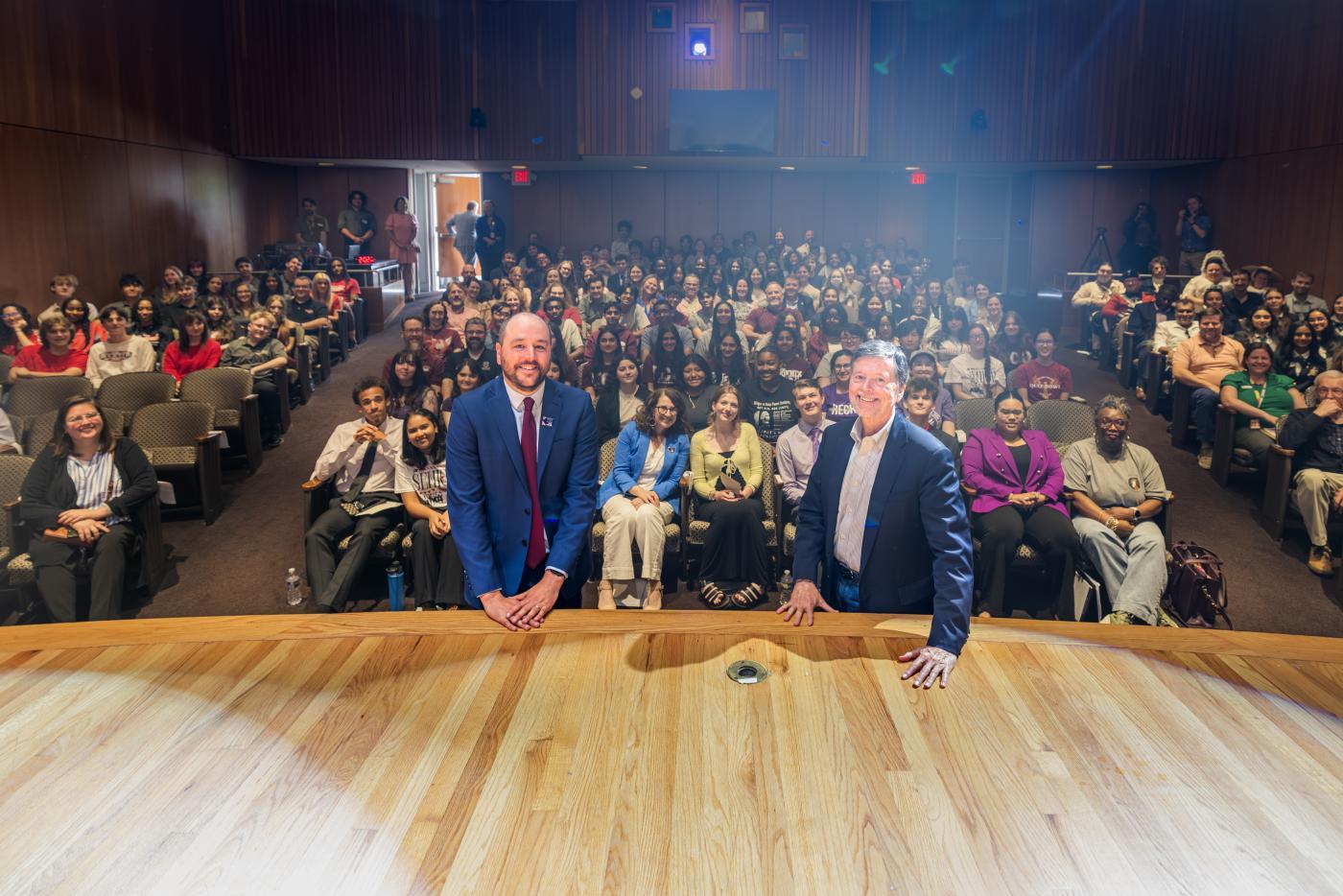 Ken Burns and David Schmidt pose with the audience.