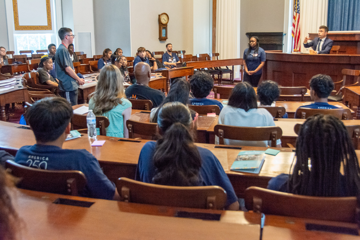 Students participate in an immersive legislature simulation in the historic chambers of the North Carolina State Capitol building.