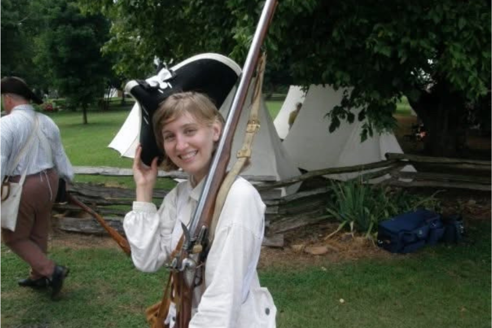 Rebecca Barefoot in revolutionary war clothing.