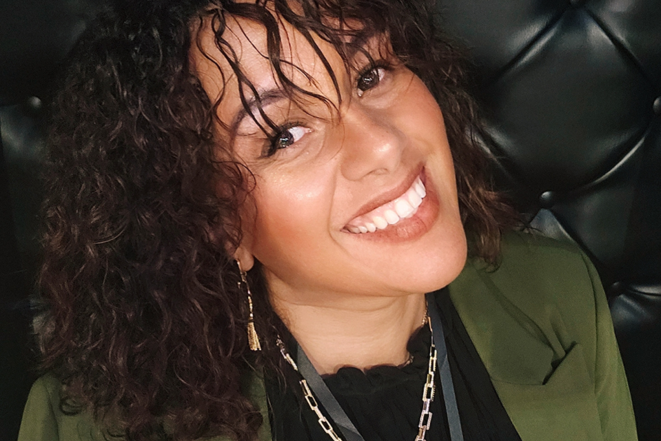 Simonae Williams smiles at the camera.