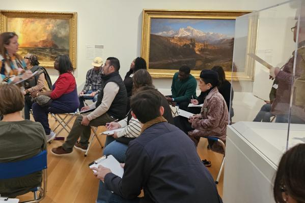 people looking at art in a museum