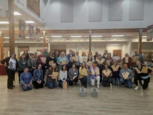 Western NC Teachers proudly show off the worries and challenges they "smashed" to overcome.