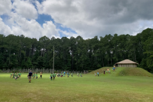 Students walk down from a Mississippian Indian Mound