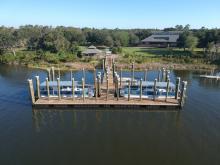 A pier with two ferries for Hammocks Beach State Park