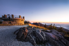 Stone observation on mountain top at sunrise