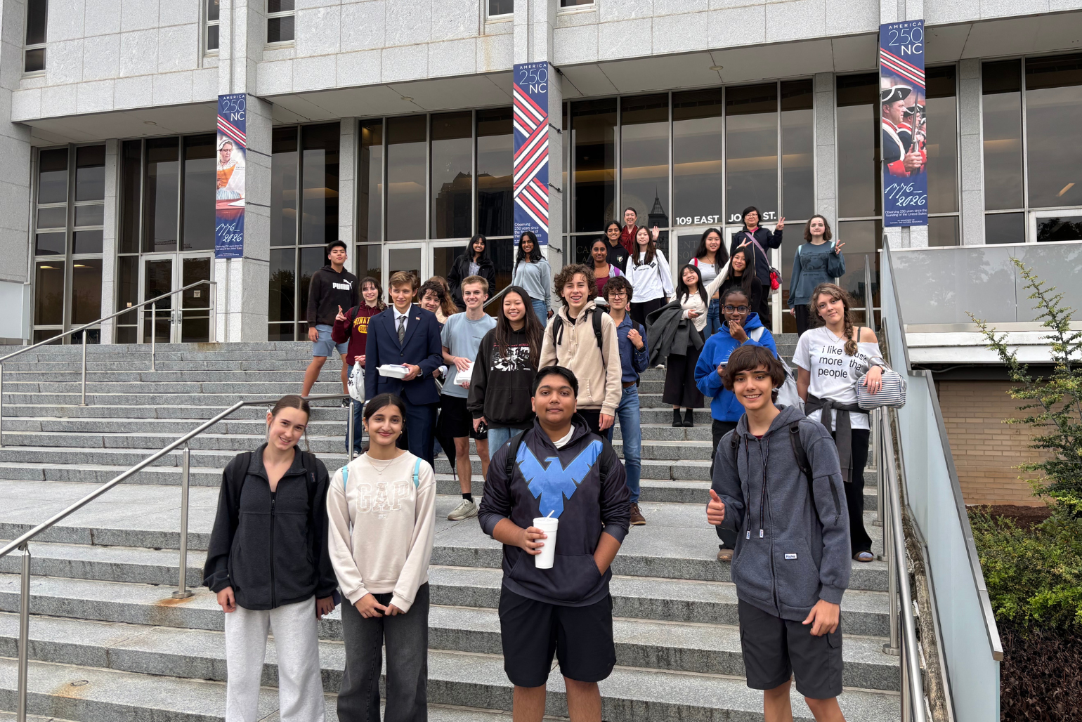 Students pose on the steps of DNCR.