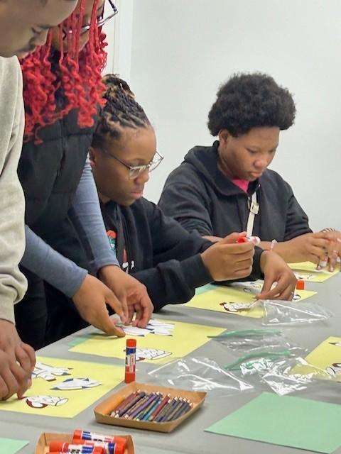 Students work on a craft about Indigenous Cultures.
