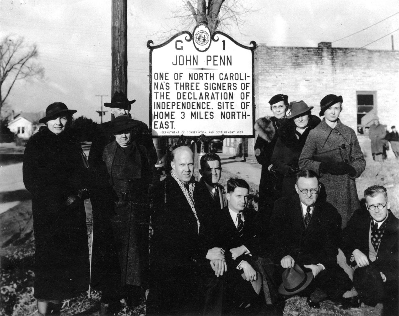 B&W people standing around John Penn Historical Marker