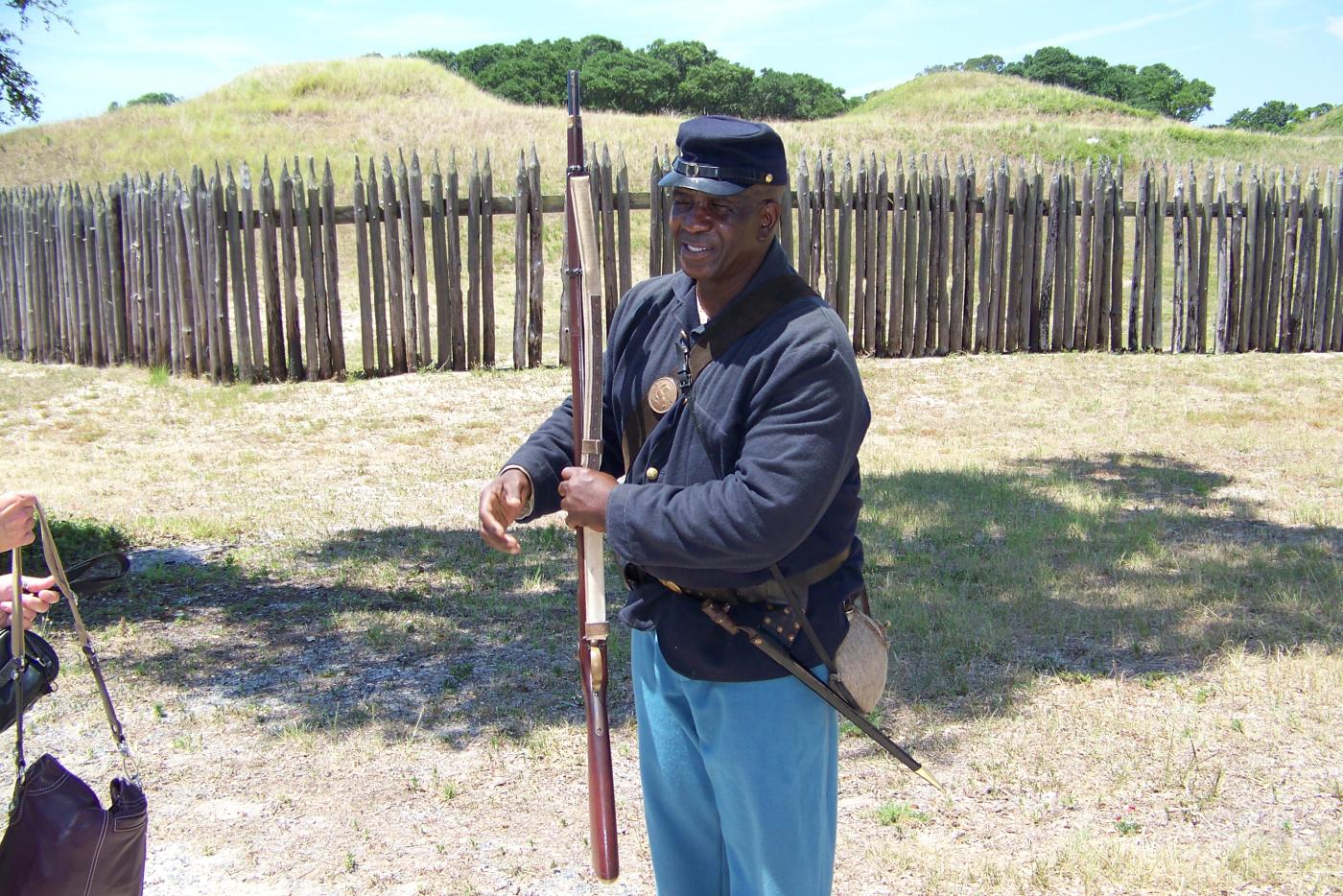 A historical interpreter dressed as a Civil War Union soldier.