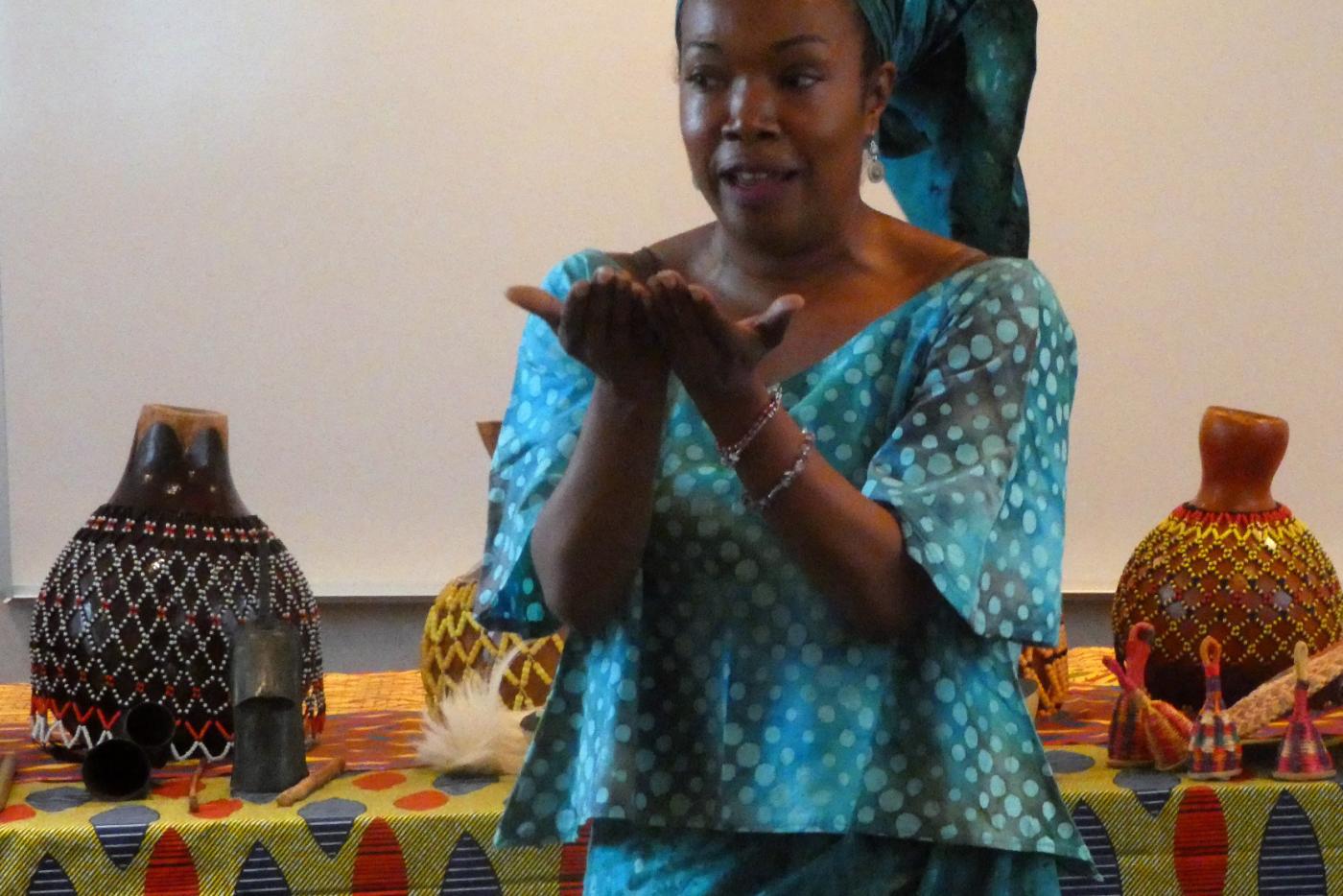 Woman stands in front of exhibit