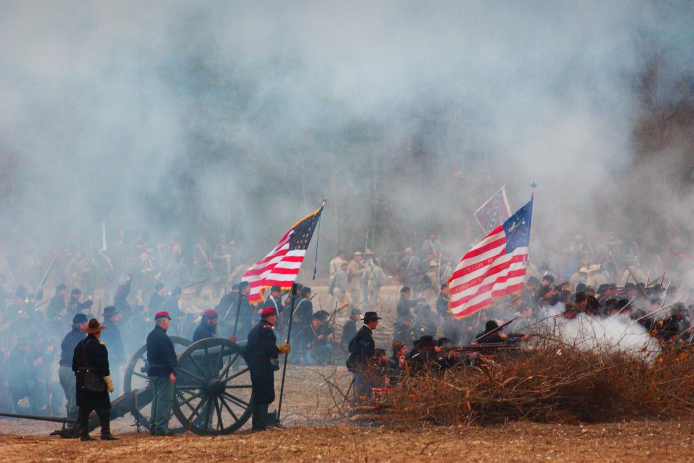 Historical interpreters reenacting a Civil War battle.
