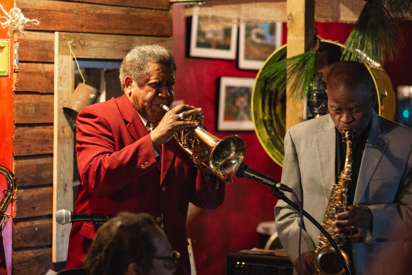 Two men playing instruments