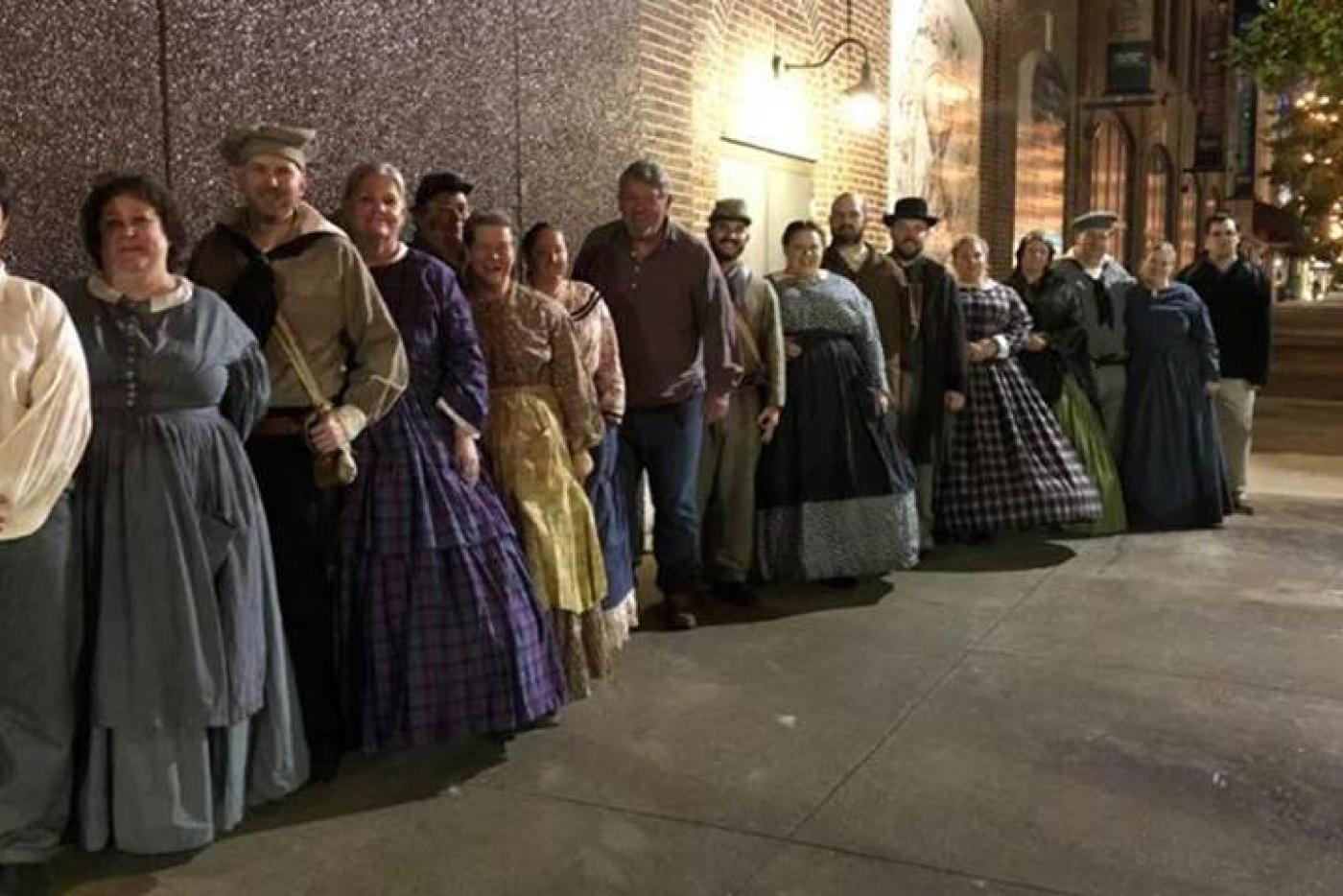 A lineup of historical interpreters dressed in Civil War era clothing.
