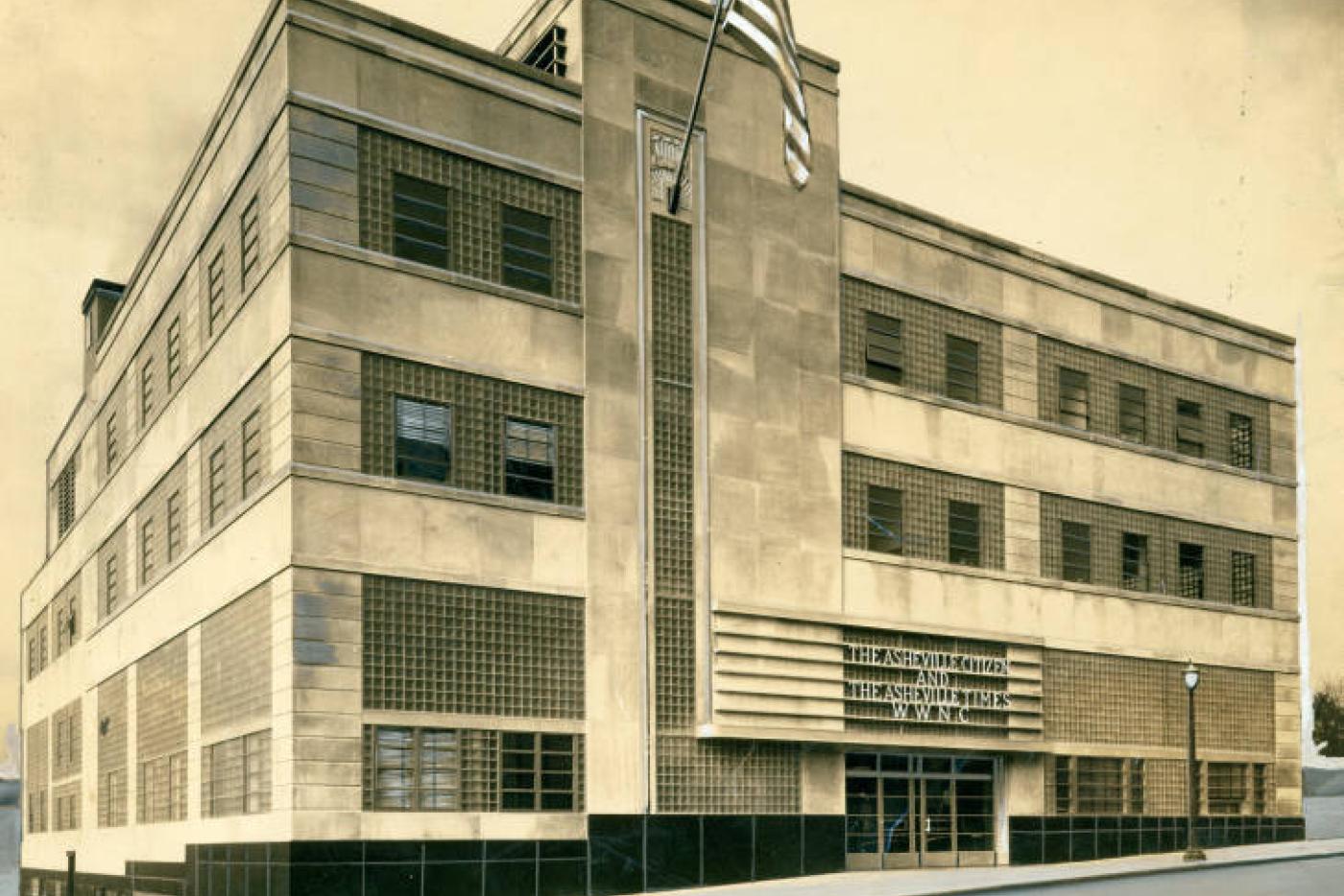 A building with the opening sign "The Asheville Citizen and Asheville Times: WWNC"