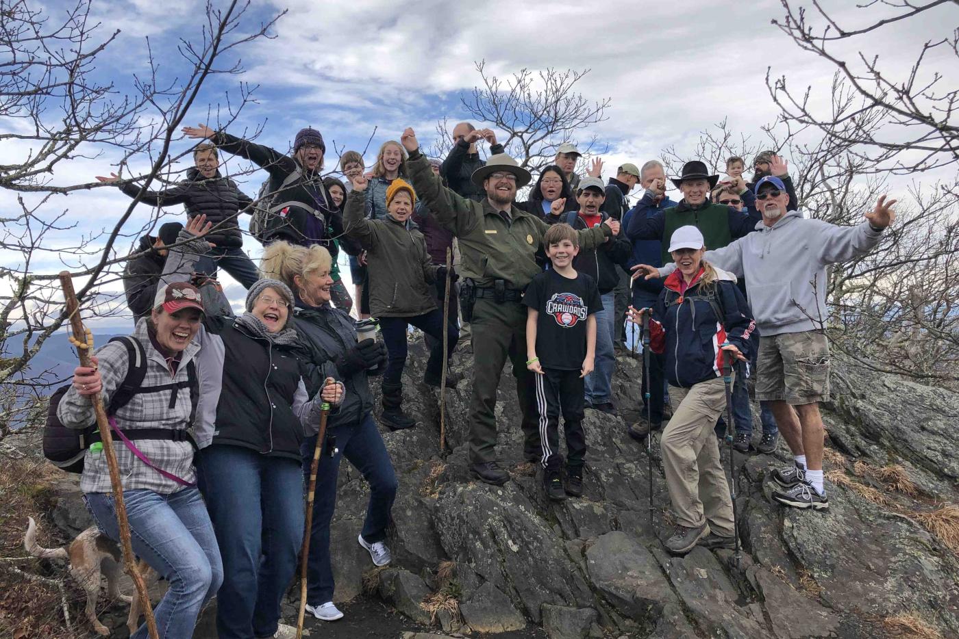 A large group of hikers at Luther Rock.