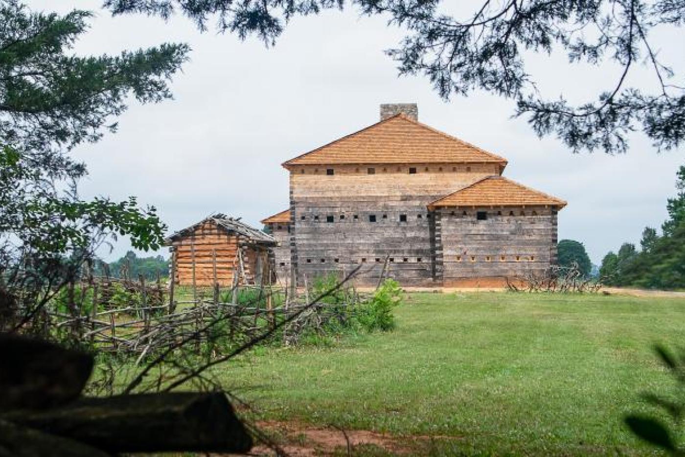 Fort Dobbs, a large wooden fort, multiple stories high.