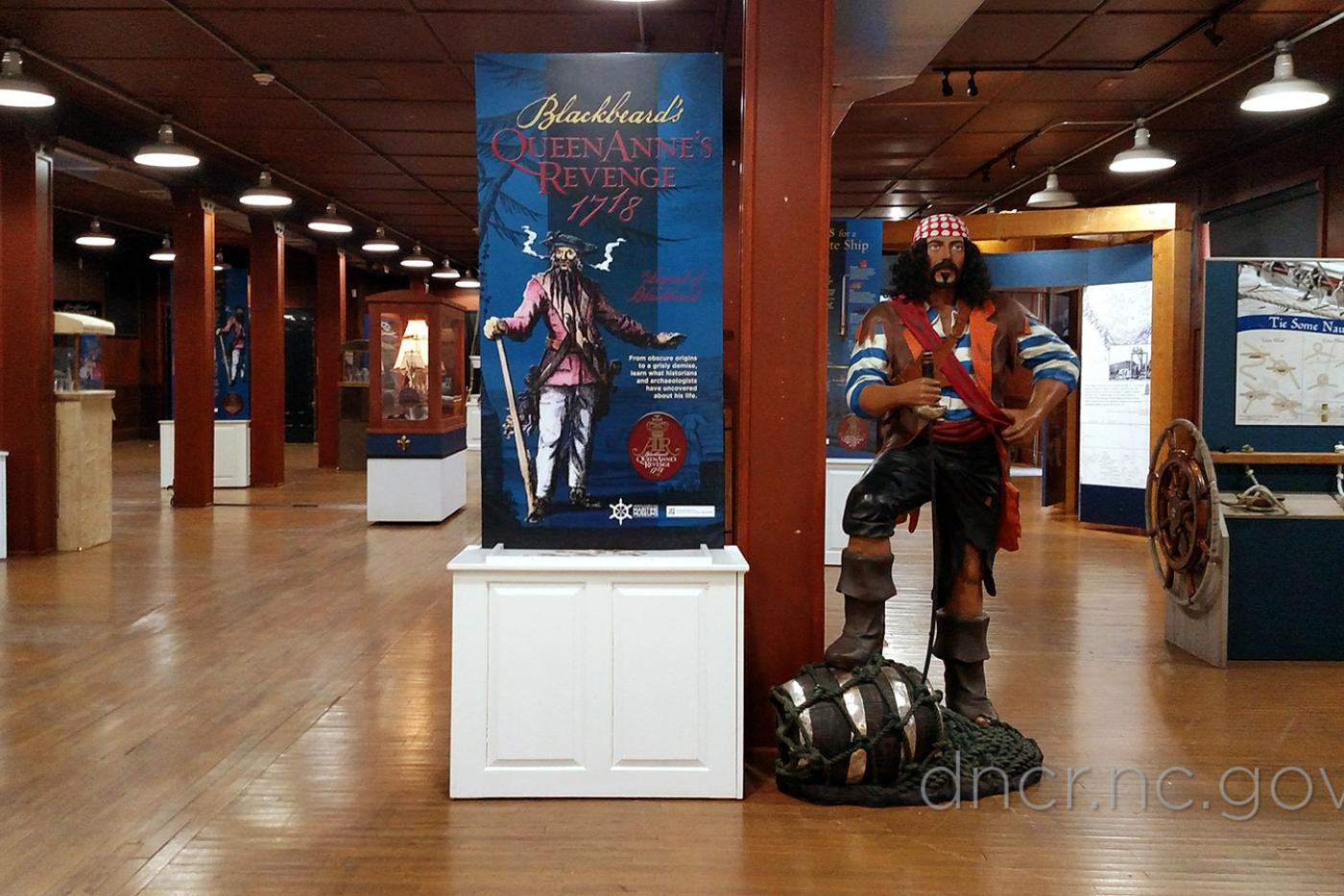 An exhibit full of pirate iconography.