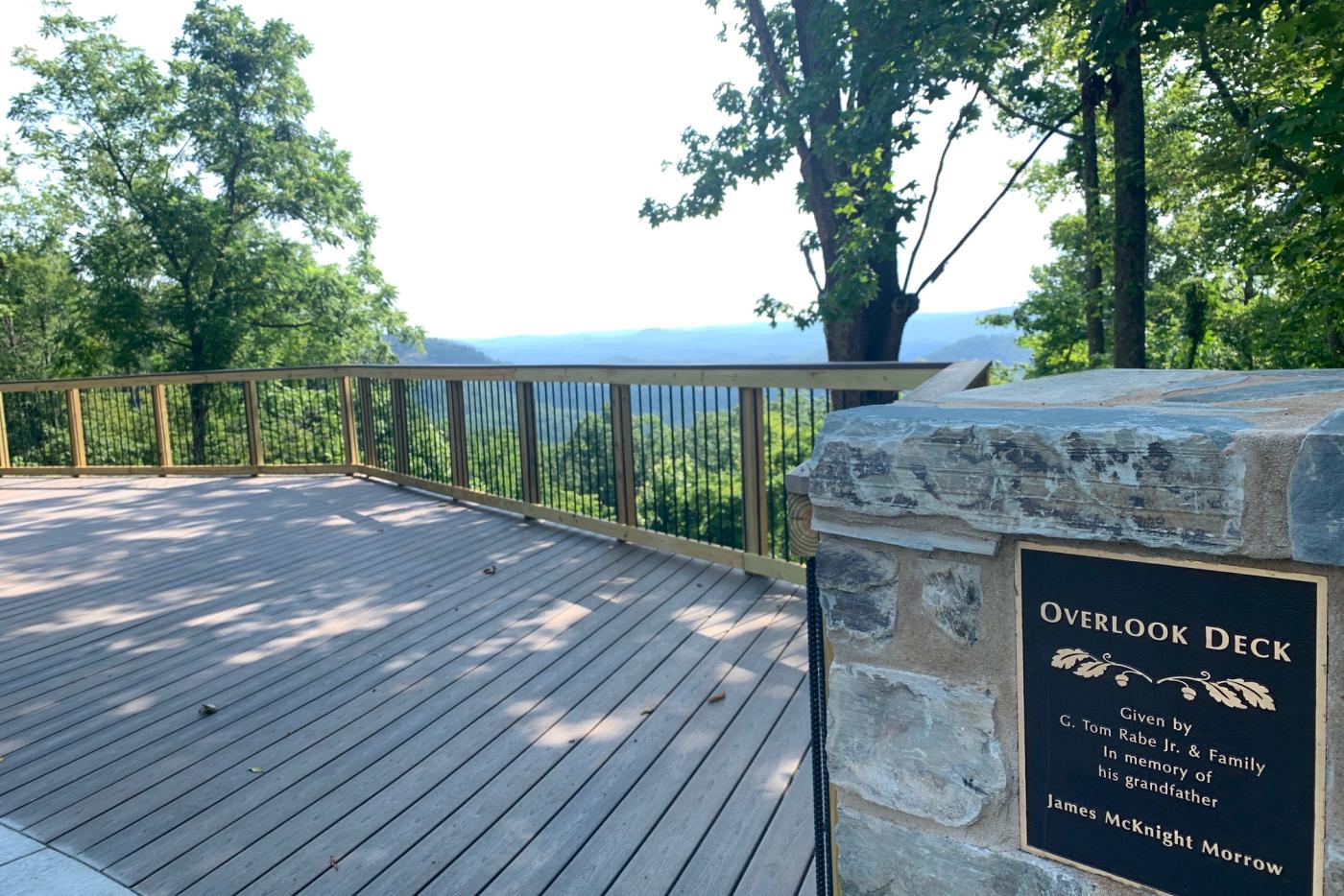 An observation deck overlooking a mountain.