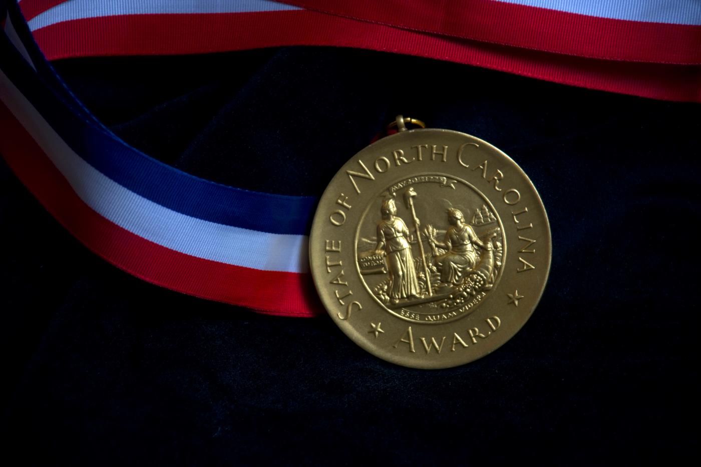 A medal from the North Carolina Awards.