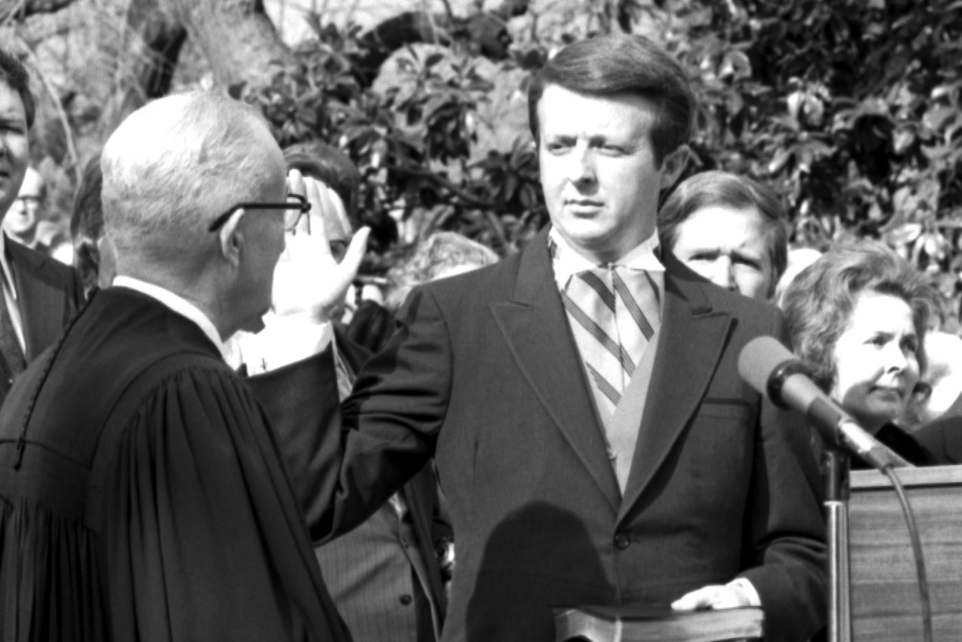 A photo of Governor James Holshouser being sworn in.
