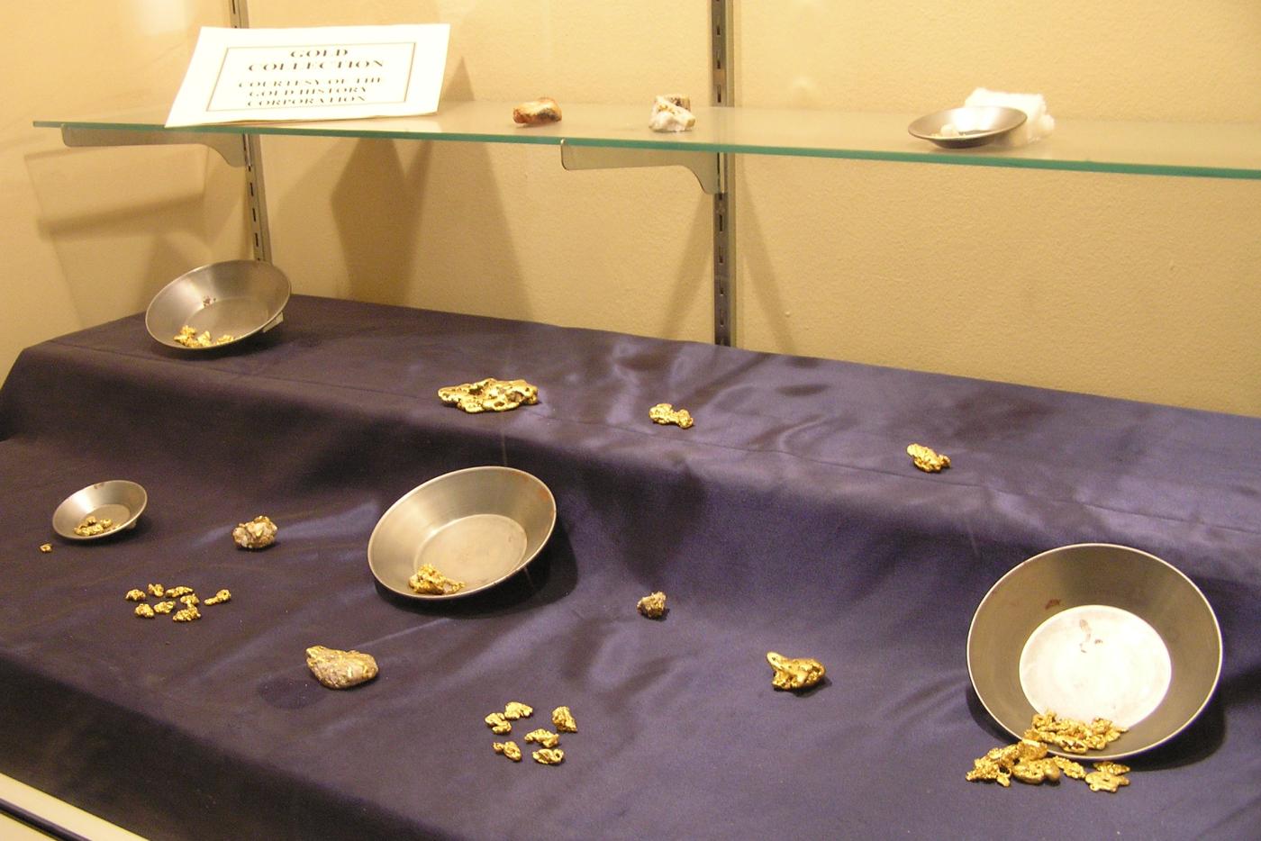 An exhibit full of gold nuggets.