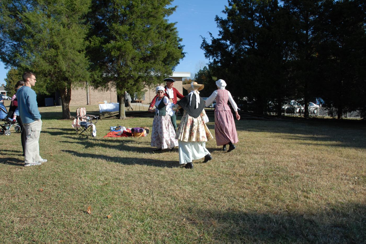 Historical interpreters in a field.