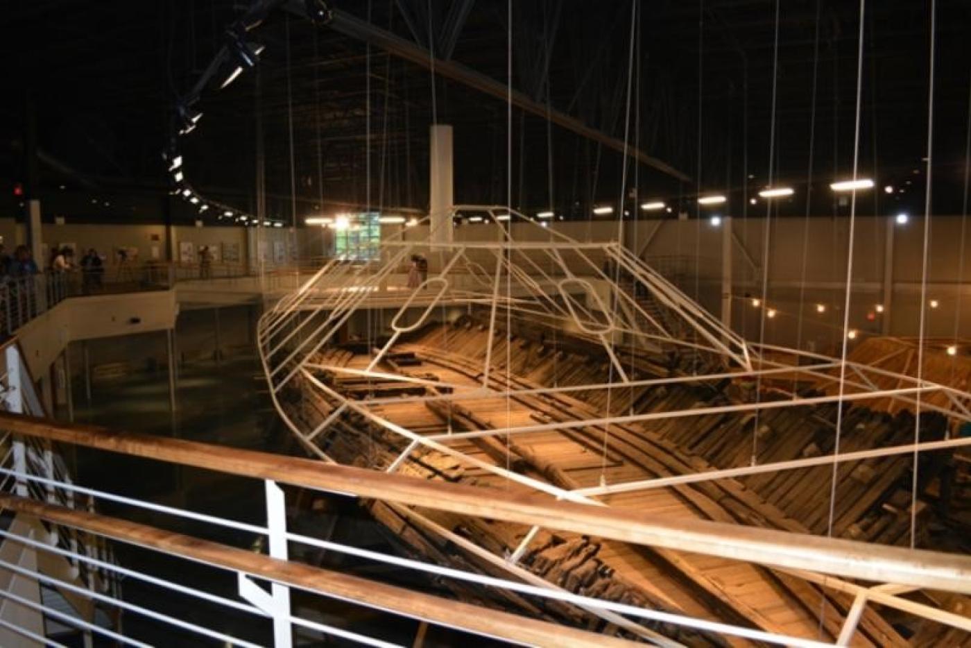 A boat stripped of its exterior, leaving the inside viewable.