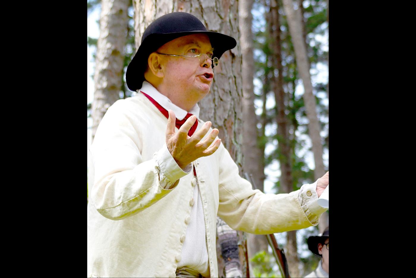 An historic interpreter portrays one of the leaders of the Regulator Movement, Herman Husband.