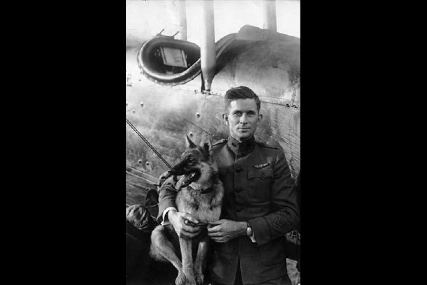 Lt. Belvin Womble Maynard with his dog Trixie.