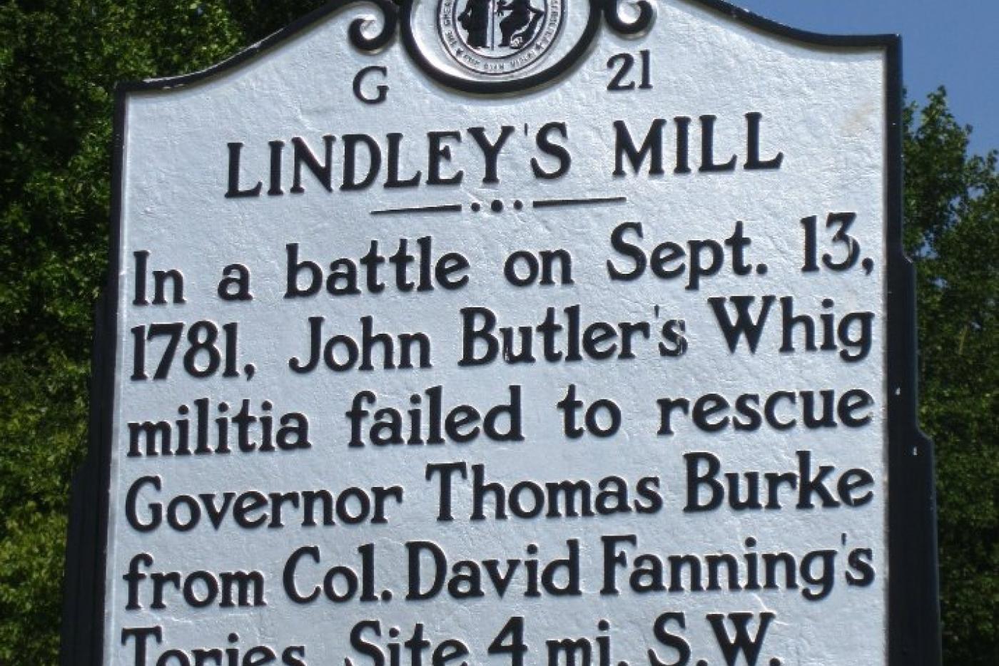 Historical marker reads: In a battle on Sept. 13, 1781, John Butler's Whig militia failed to rescue Governor Thomas Burke from Col. David Fanning's Tories. Site 4 mi. S.W.