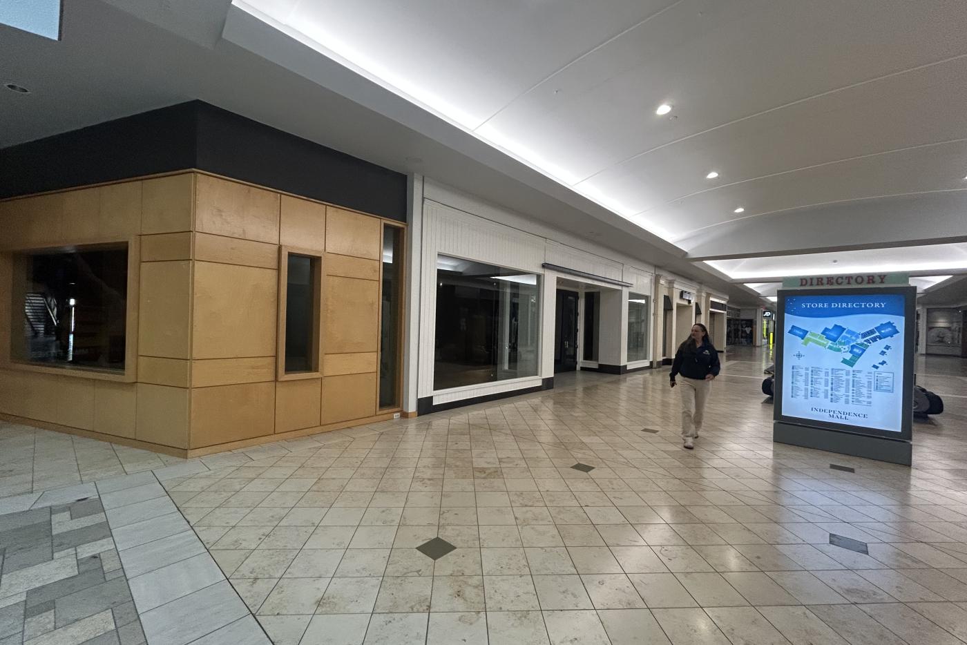 Joanna Zazzali, the director of the North Carolina Aquarium at Fort Fisher strolls along the front of the future Discovery Cove, a unique aquatic experience at Independence Mall in Wilmington. 